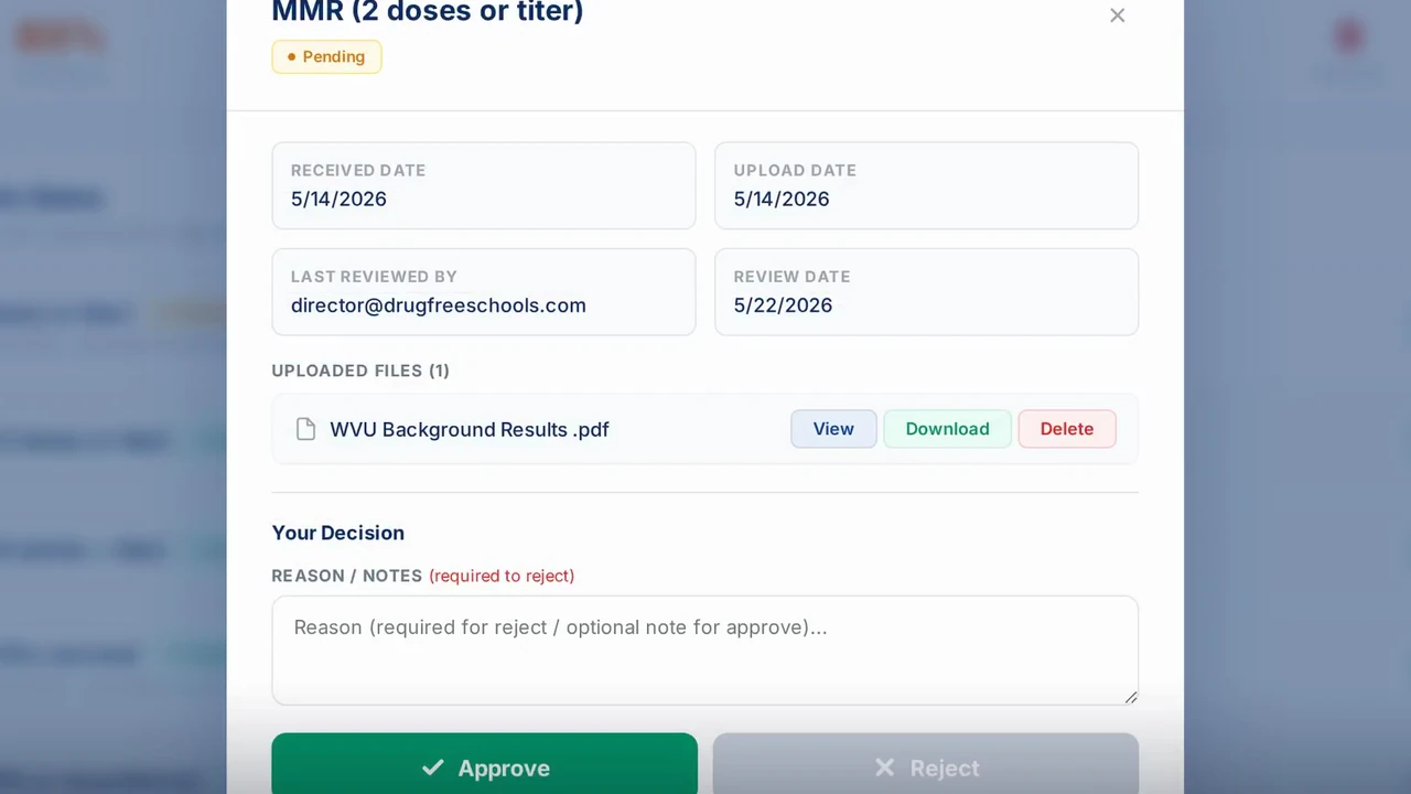 Document review window for an MMR record with upload and review dates, a reason box, and Approve and Reject buttons.